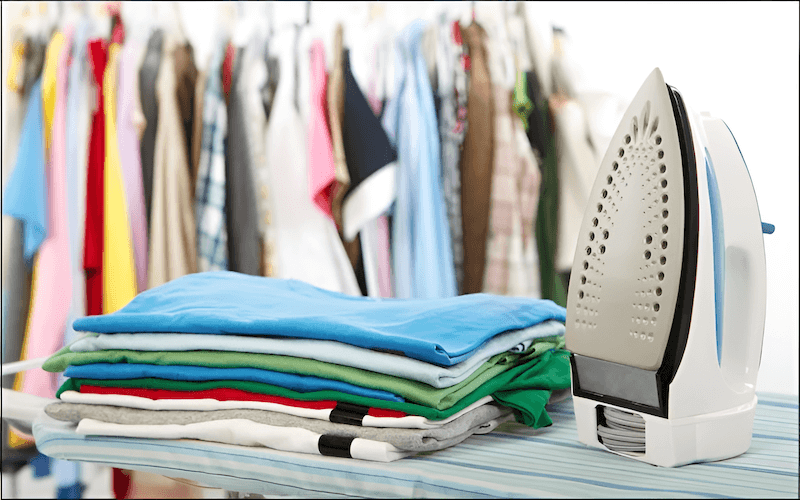 As soon as you finish ironing a garment section, hang it or fold it neatly