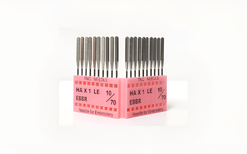 A size 9/70 or 70/10 needle is generally best for lighter fabrics