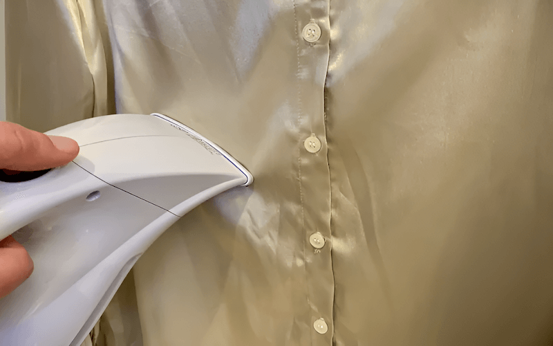 Steaming is a gentler alternative to ironing for removing wrinkles from silk.