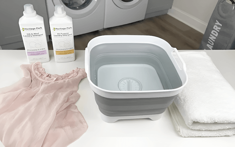 To hand wash silk, follow these steps: turn the garment inside out, fill the basin with cool water, add a small amount of gentle detergent, and submerge the silk