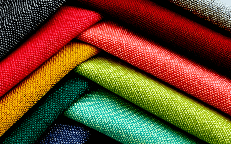 Woven fabrics are constructed by interlacing two sets of yarns at right angles