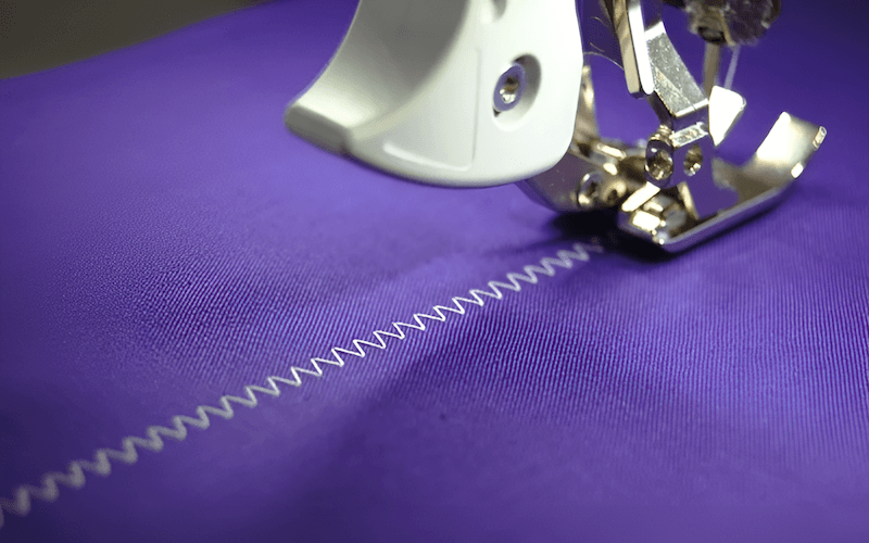 The zigzag stitch offers versatility beyond the straight stitch