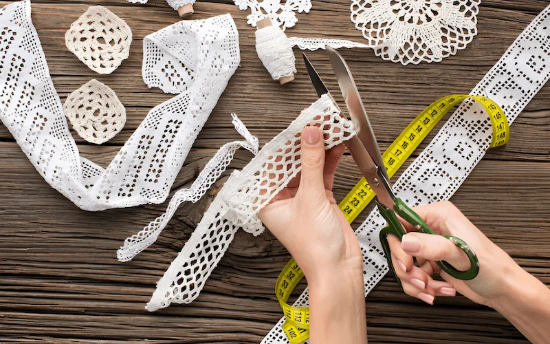 Ironing, cutting, and marking lace require care to protect the delicate fabric