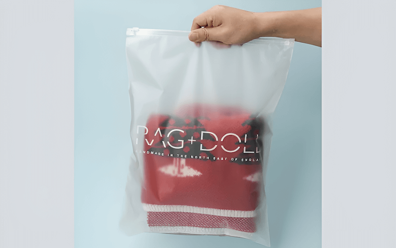 Place Sweaters in Bags