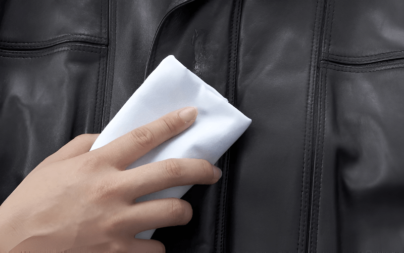 Any dirt, dust, oils, or residue on the jacket's surface can act as a barrier, preventing the patch's adhesive from properly bonding with the fabric