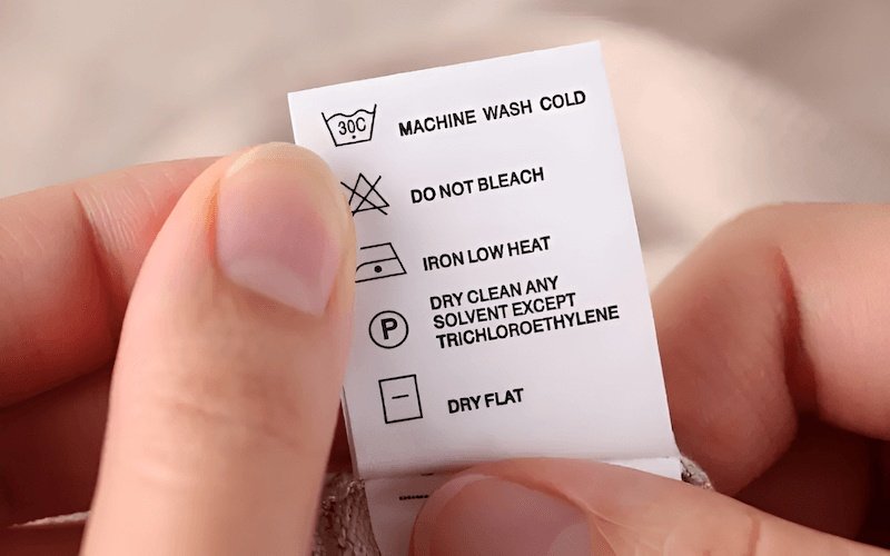 Ensure instructions cover the five core areas if applicable: Washing, Bleaching, Drying, Ironing, and Dry Cleaning