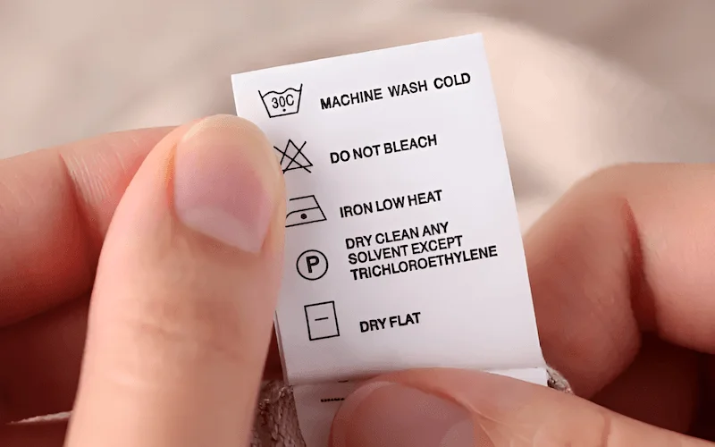 Ensure instructions cover the five core areas if applicable: Washing, Bleaching, Drying, Ironing, and Dry Cleaning