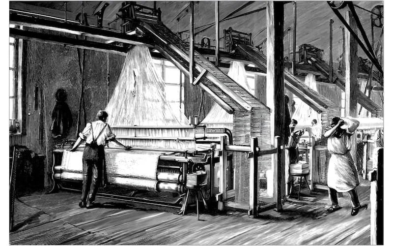 The creation of detailed woven labels occurs on a Jacquard loom