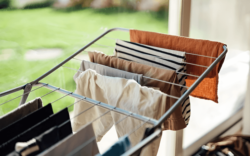 Ensure adequate airflow by spacing clothes apart on the drying rack or clothesline