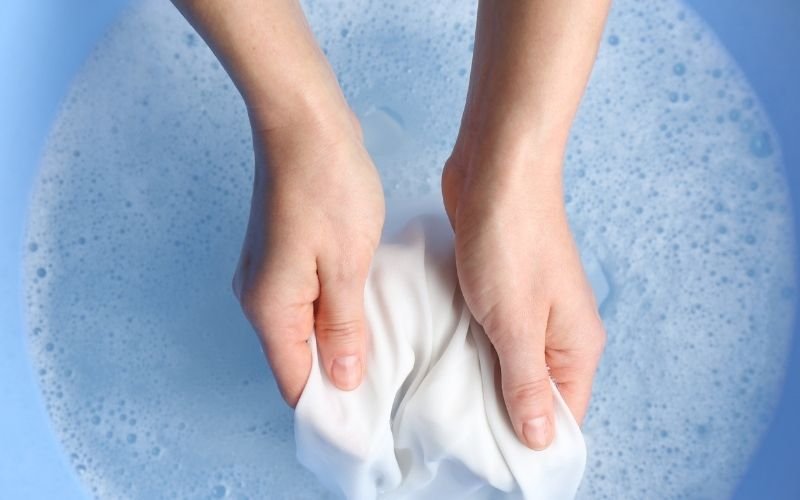 Perform a Colorfastness test before proceeding, especially on colored whites or items with colored trims