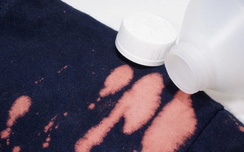 Concentrated Bleach is highly corrosive and can cause immediate Fabric Damage
