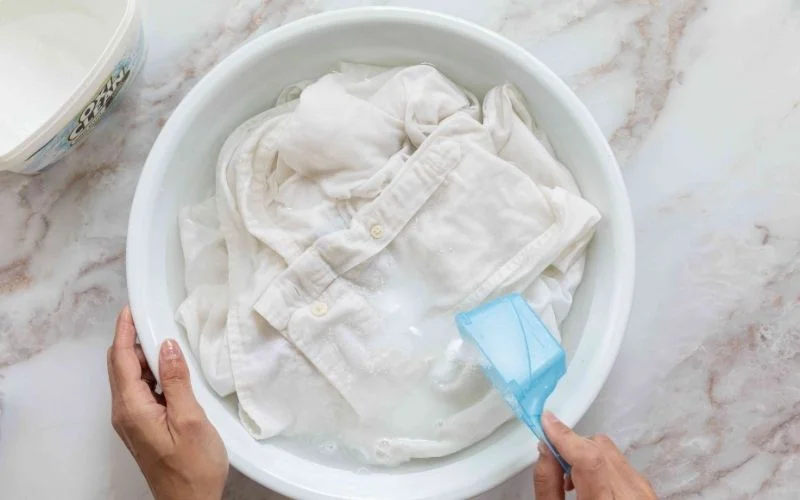Soaking is effective for tackling overall dinginess or treating multiple items uniformly