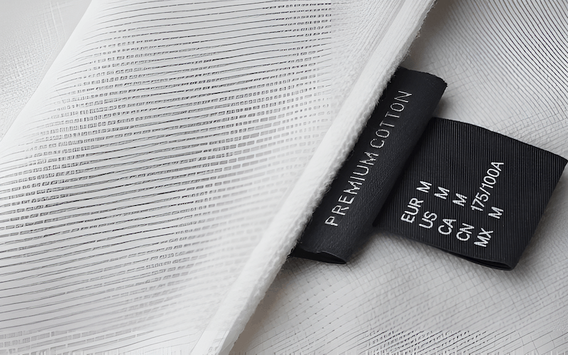 Woven labels, with their design integrated into the fabric's weave, generally exhibit superior longevity.