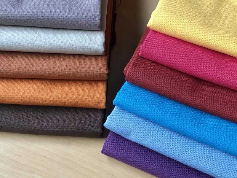 Assortment of colorful cotton fabrics ideal for beginners.