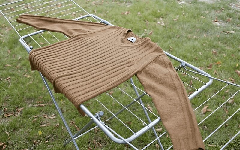 Avoid hanging heavy knits when wet, and always lay them flat to dry