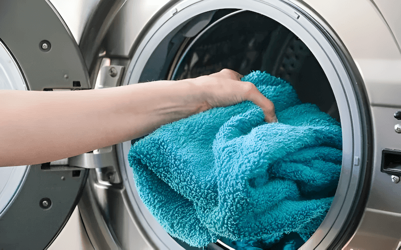 Machine drying on a medium to high heat setting is generally acceptable for towels and bedding, providing a fluffy and soft result