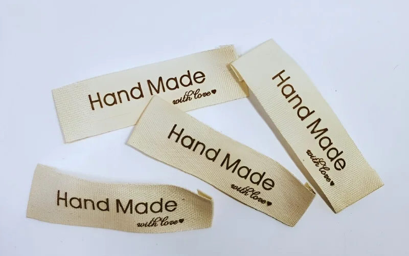 Cotton presents a viable and often preferred option for both labels and tags
