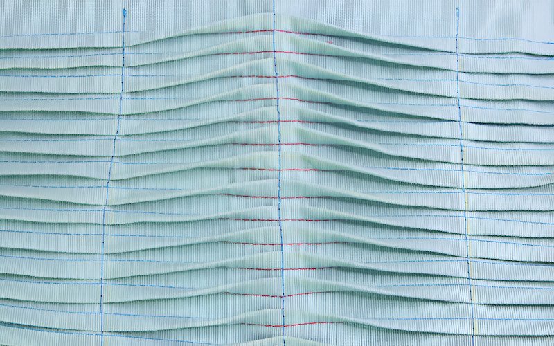 Pin Tucks are very narrow, carefully stitched folds