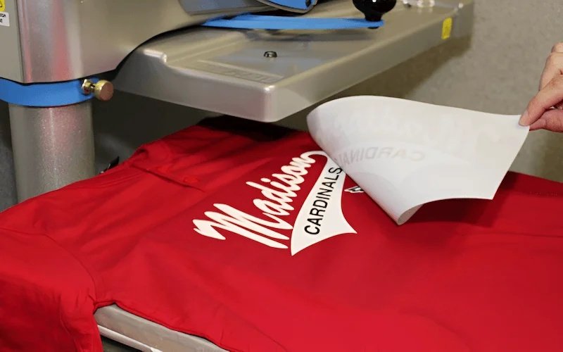Applying a graphic to apparel using a heat press