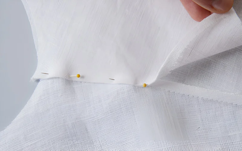 The easiest way to spot it is to look for the seams on yoke