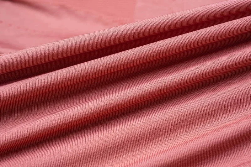 Synthetic fibers: Polyester, nylon, spandex offer durability, stretch.