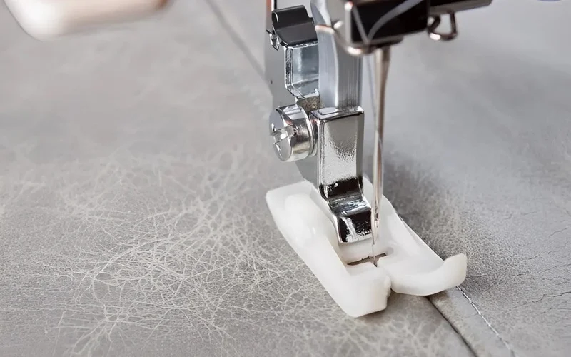 You don't need to buy many different presser feet if you are a beginner; the standard foot will handle most basic sewing tasks