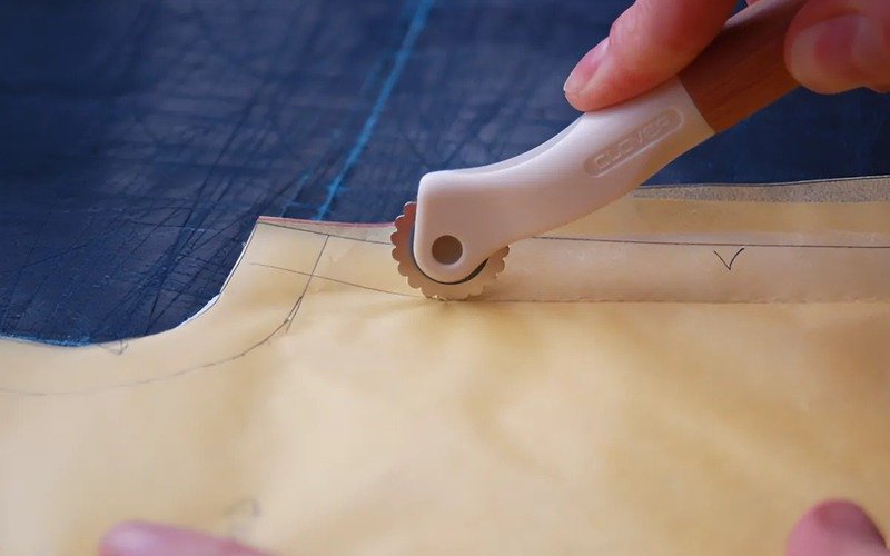 The main job of a tracing wheel is to transfer markings from a sewing pattern onto your fabric