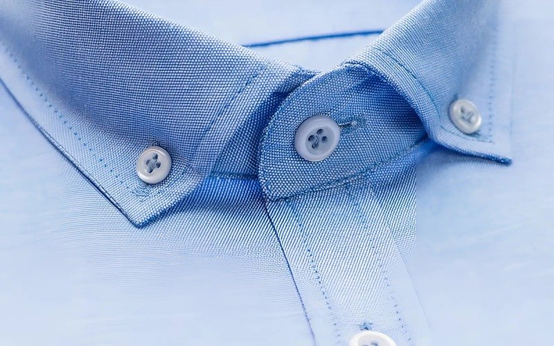 A bar tack at the end of a buttonhole, preventing tearing from repeated use[/caption>