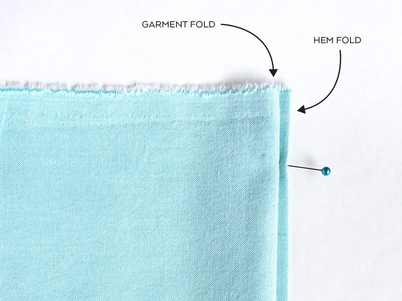 Prepping your fabric: The crucial 'Z' fold for blind hemming.