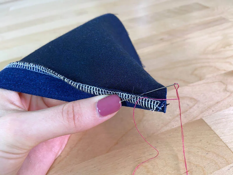 Hand-sewn perfection: Crafting an invisible blind hem stitch.