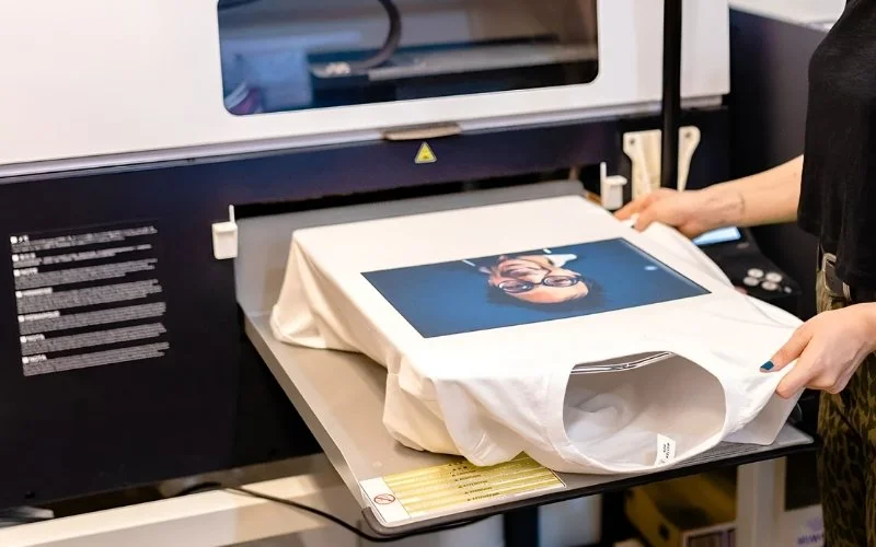 For just one t-shirt with a detailed photo, digital printing (DTG) is often great