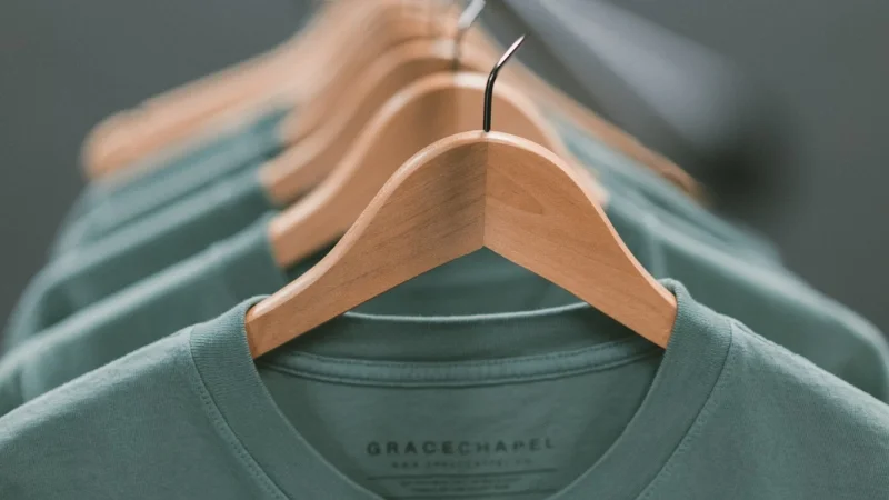 When discussing apparel accessories, 'Features' and 'Finishes' refer to distinct aspects of the product