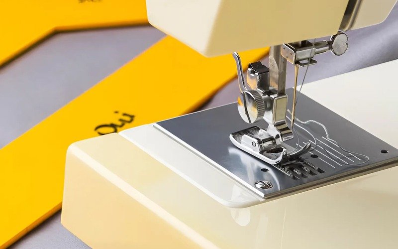 The feed dog moves the fabric a precise amount for each stitch