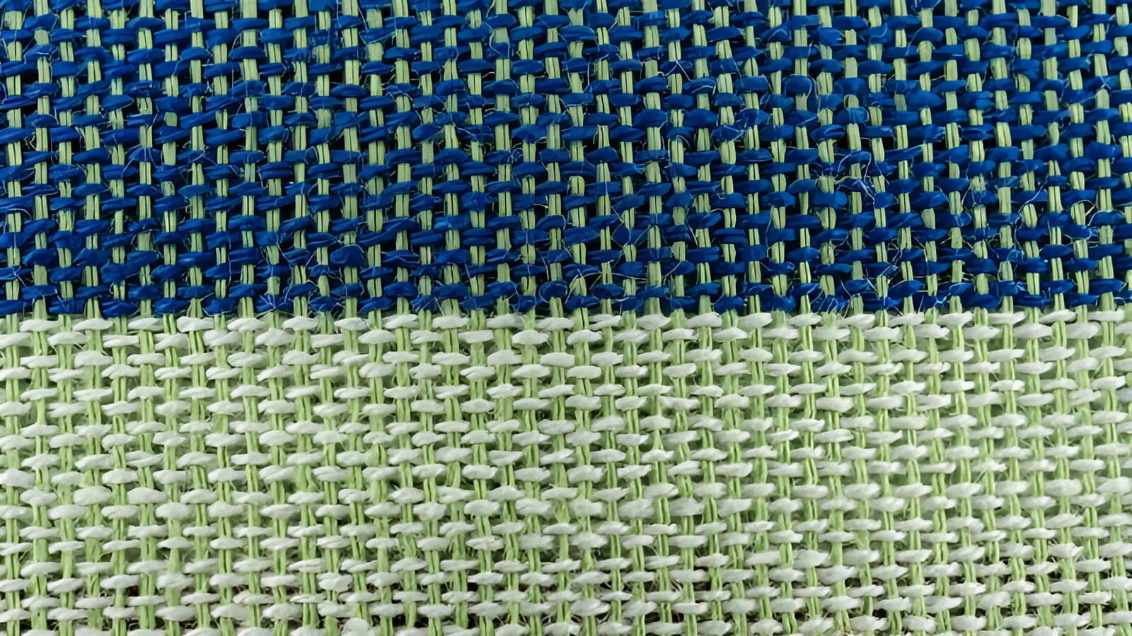 Made by weaving threads over and under each other, like a basket