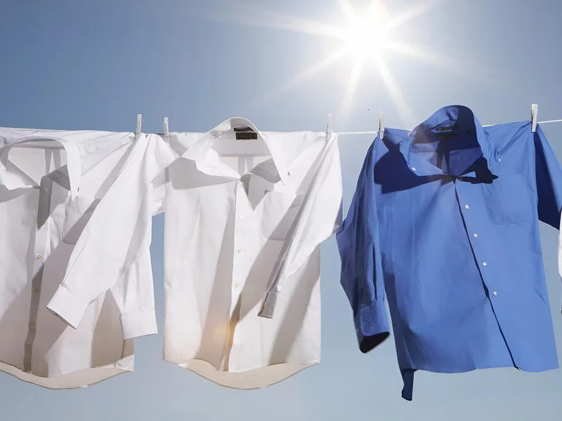 Hanging poplin items to dry.