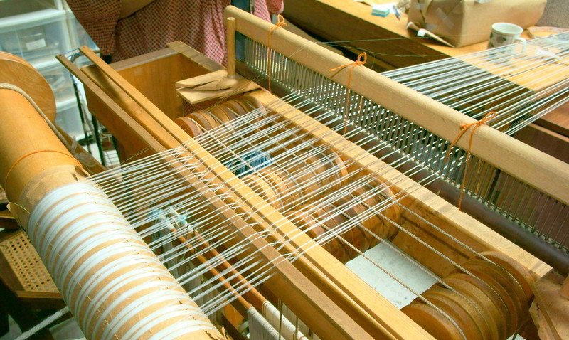 The delicate art of reeling fine silk threads.