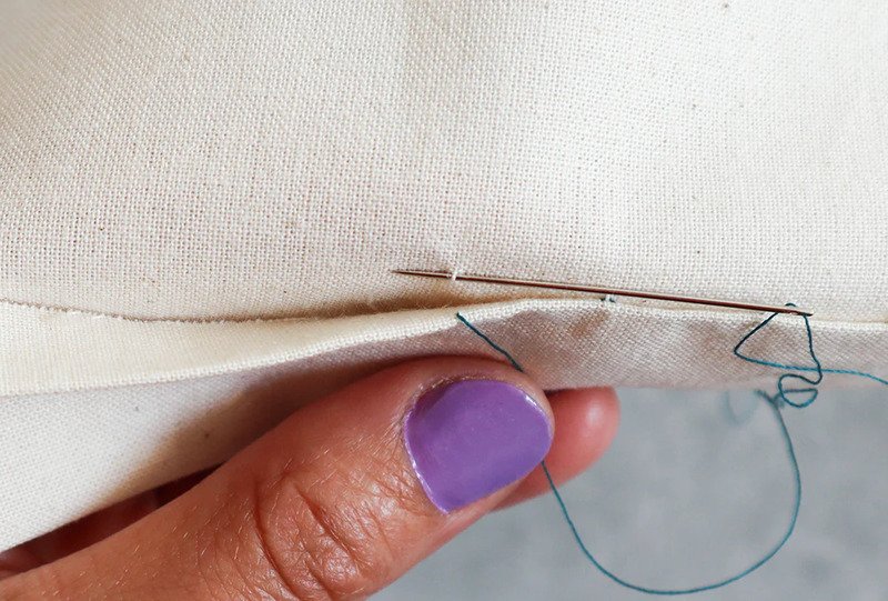 The humble stitch: A tiny loop, a mighty hold.