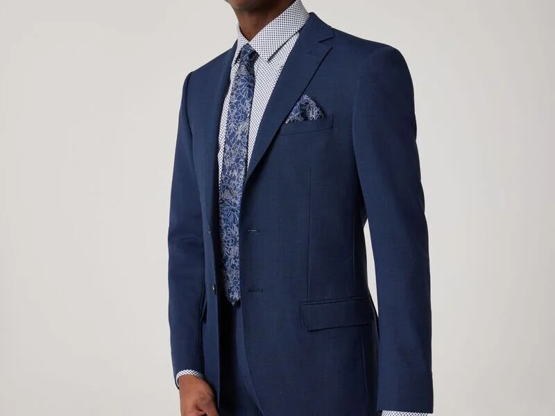 Formal wear essential: Welt pockets add a touch of class.