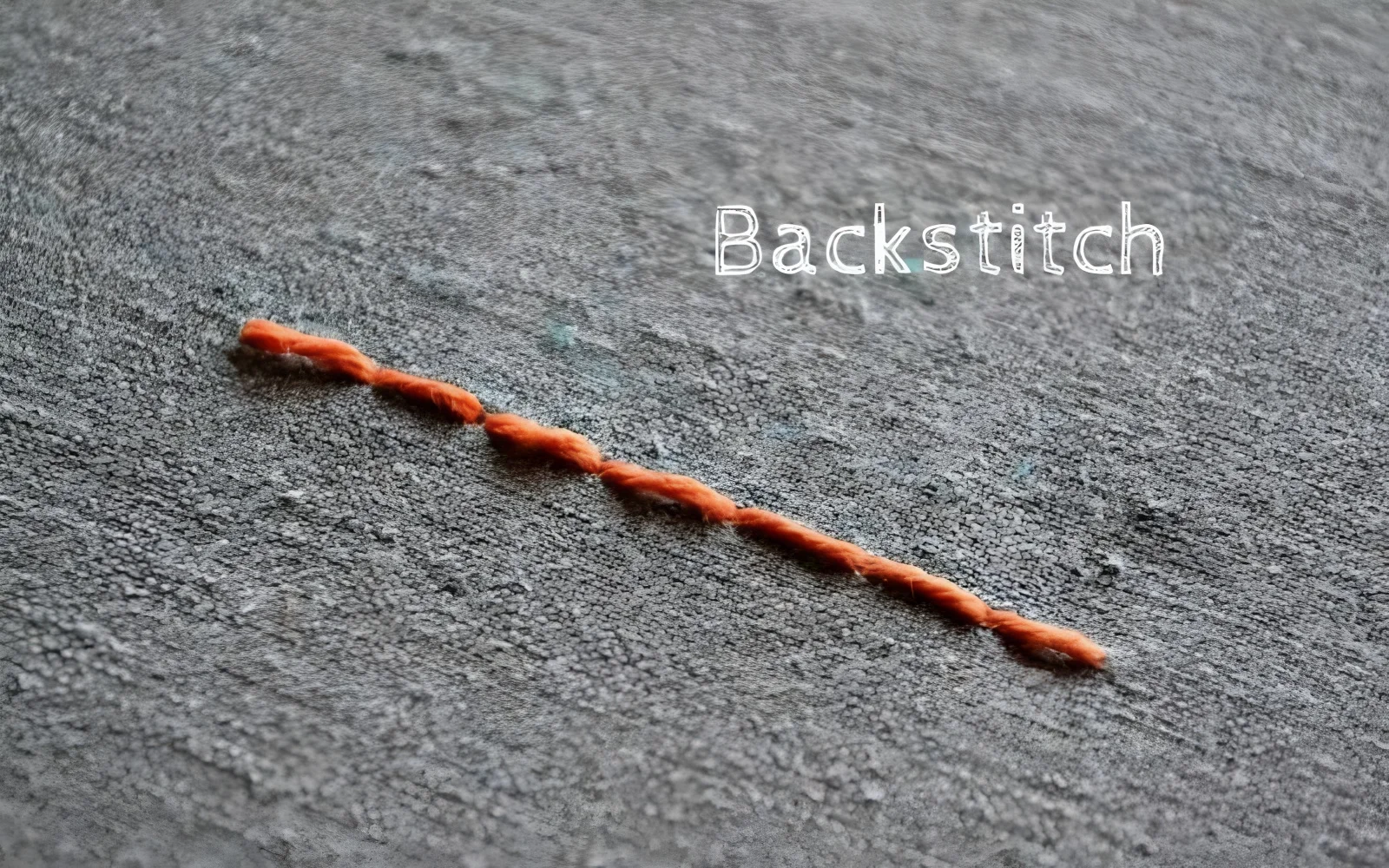 The backstitch creates a strong, continuous line similar to a machine stitch, making it ideal for securing patches
