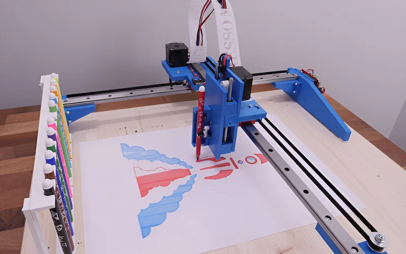 A pen plotter has a special arm that holds one or more pens