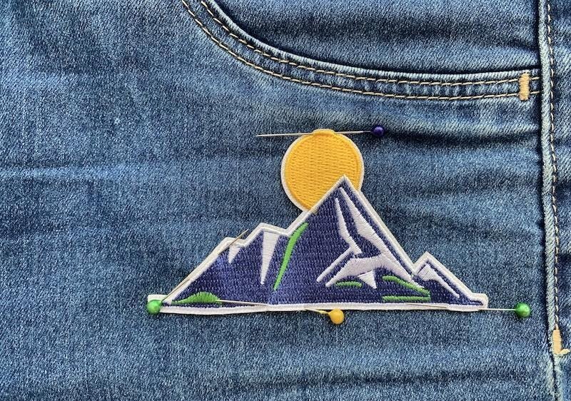 Pin it in place to ensure perfect placement before you sew.