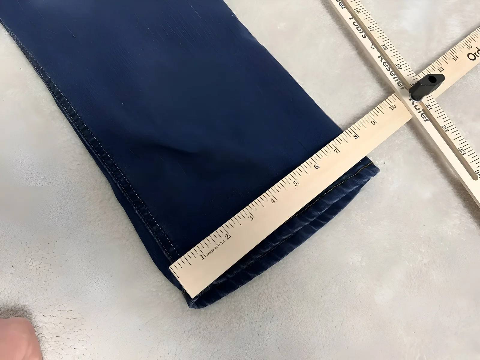 Measure on a hard, flat surface.