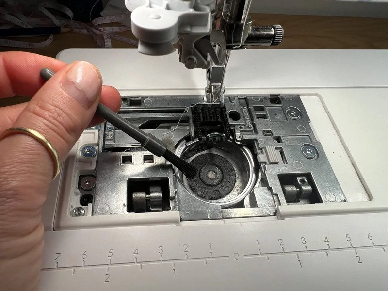 Keep your needle clean for effortless stitching through adhesive.